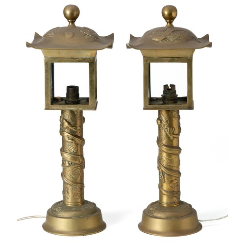 653 - A PAIR OF CHINESE BRASS LANTERNS