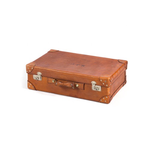 890 - A LEATHER SUITCASE