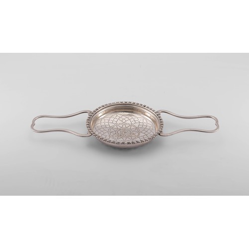 394 - A GEORGE III SILVER LEMON STRAINER, ALEXANDER JOHNSTON, LONDON, 1763