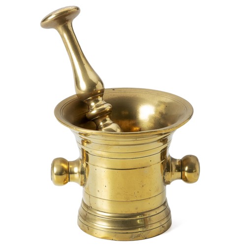 947 - A BRASS MORTAR AND PESTLE