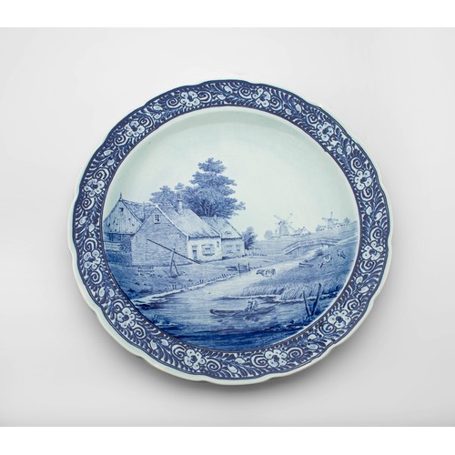 618 - A BLUE AND WHITE 'ROYAL SPHINX' DELFT WALL PLATE