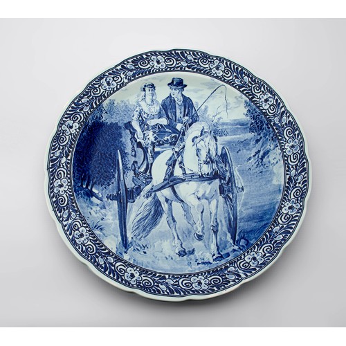 619 - A BLUE AND WHITE 'ROYAL SPHINX' DELFT WALL PLATE