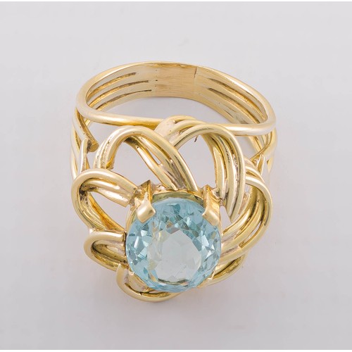 724 - A GOLD AND GEMSTONE RING