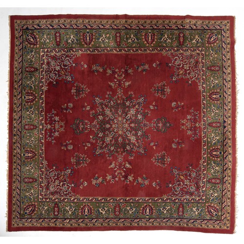 21 - AN EAST EUROPEAN RUG 324 by 273cm