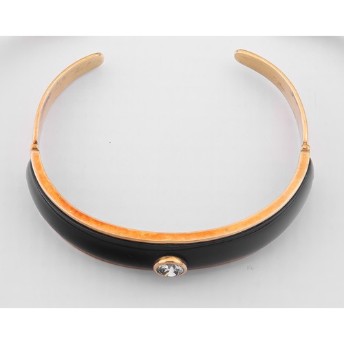 701 - A GOLD AND DIAMOND BANGLE