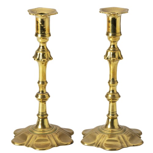 951 - A PAIR OF BRASS CANDLESTICKS