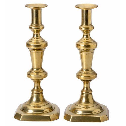 953 - A PAIR OF BRASS CANDLESTICKS