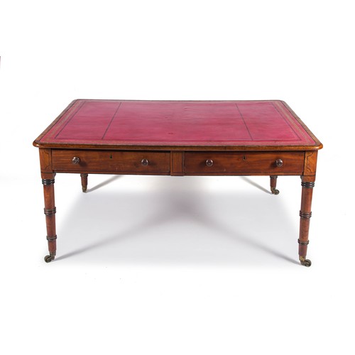 153 - A GEORGE IV MAHOGANY WRITING TABLE