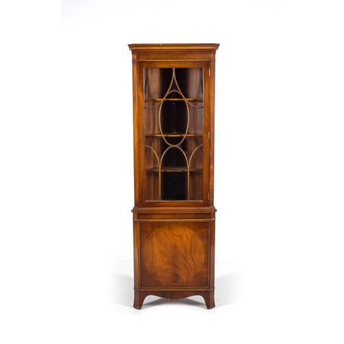 181 - A MAHOGANY CORNER CUPBOARD