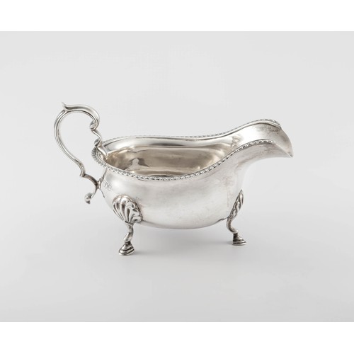 443 - A GEORGE V SILVER SAUCE BOAT, GOLDSMITHS AND SILVERSMITHS CO LTD, LONDON, 1915