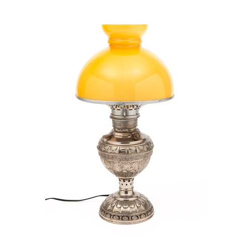 241 - AN OIL LAMP WITH  DOMED YELLOW GLASS SHADE, ELECTRIFIED