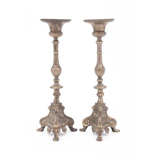 323 - A PAIR OF BRASS PRICKET CANDLESTICKS