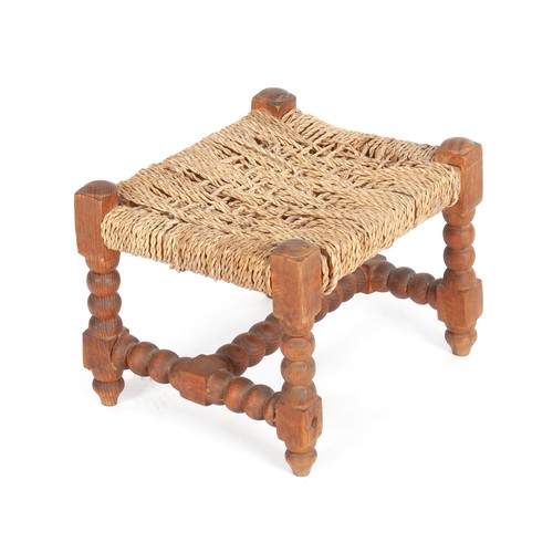 444 - A WOVEN GRASS FOOTSTOOL