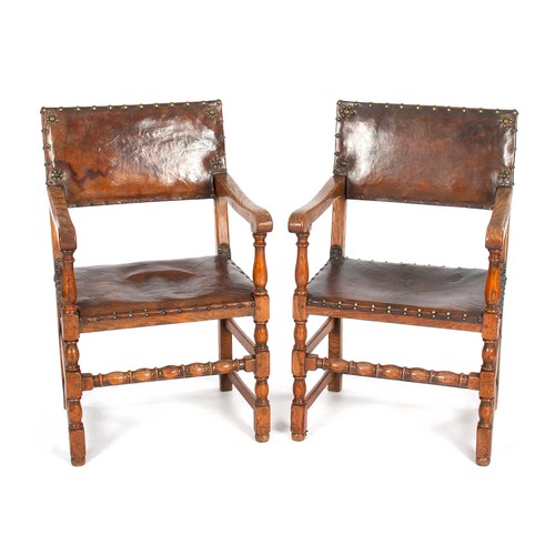 465 - A PAIR OF CROMWELLIAN-STYLE OAK AND LEATHER ARMCHAIRS