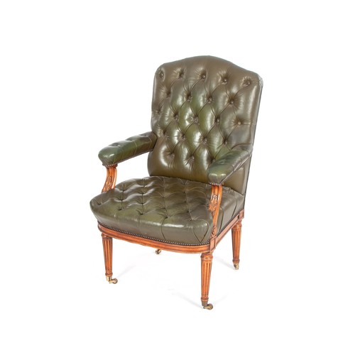 568 - A GREEN LEATHER UPHOLSTERED BUTTON BACK ARMCHAIR