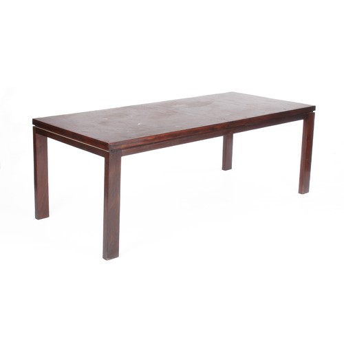 462 - A STAINED OAK EXTENDING DINING TABLE