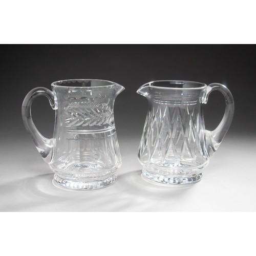 317 - A STUART CRYSTAL WATER JUG AND ANOTHER GLASS JUG