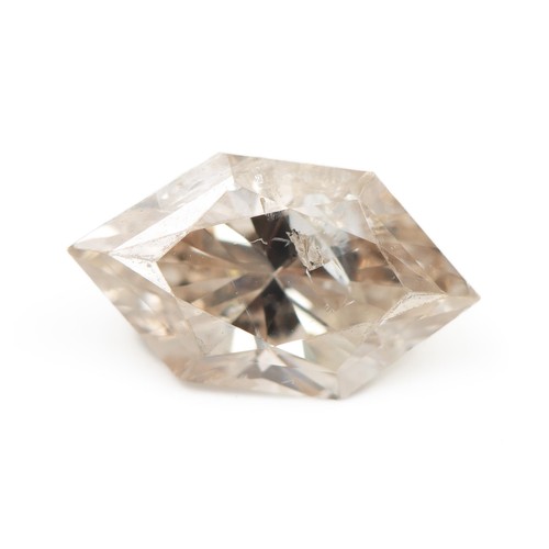 910 - AN UNSET NATURAL DIAMOND 0,71 CARATS