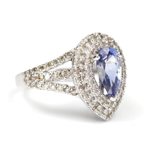 973 - A TANZANITE AND DIAMOND DRESS RING