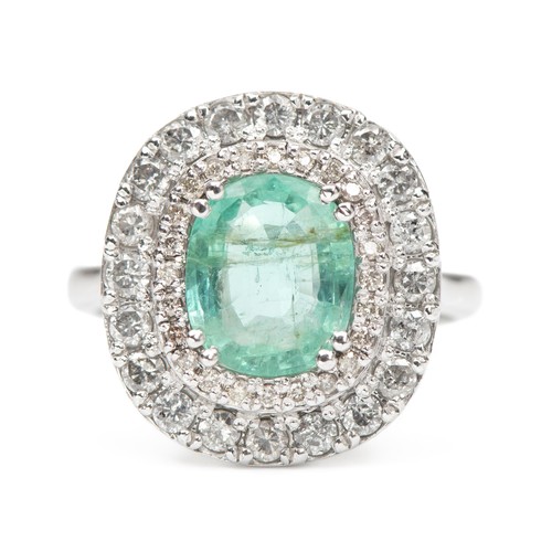 978 - AN EMERALD AND NATURAL DIAMOND COCKTAIL RING