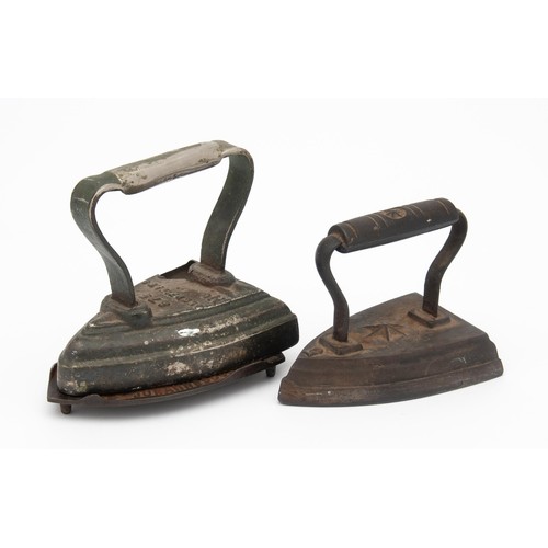 156 - TWO CAST IRON IRONS