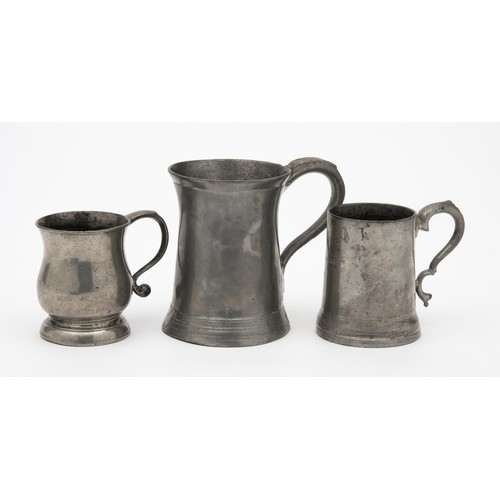 161 - A TRIO OF PEWTER TANKARDS