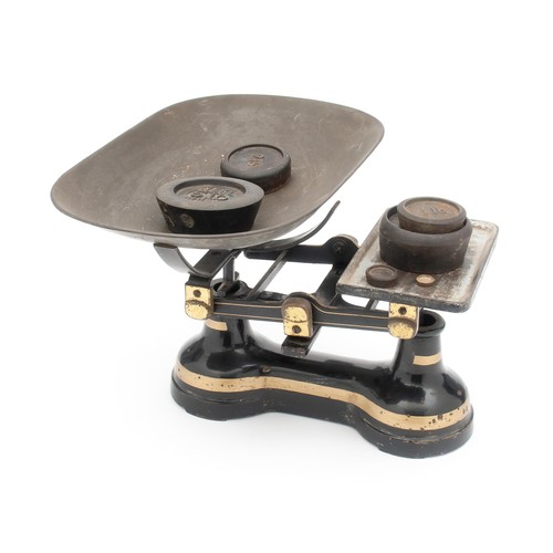 150 - A CAST-IRON AND BRASS SCALE