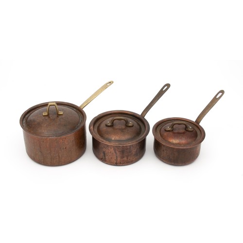 73 - A SET OF THREE COPPER SAUCE PANS