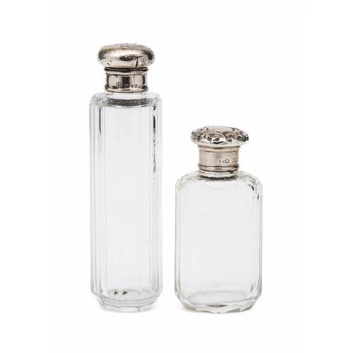 725 - TWO SILVER-TOPPED GLASS BOTTLES, LONDON, MAKER'S AND DATE MARKS RUBBED