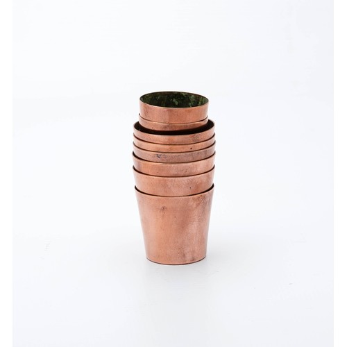 89 - NINE COPPER BEAKERS