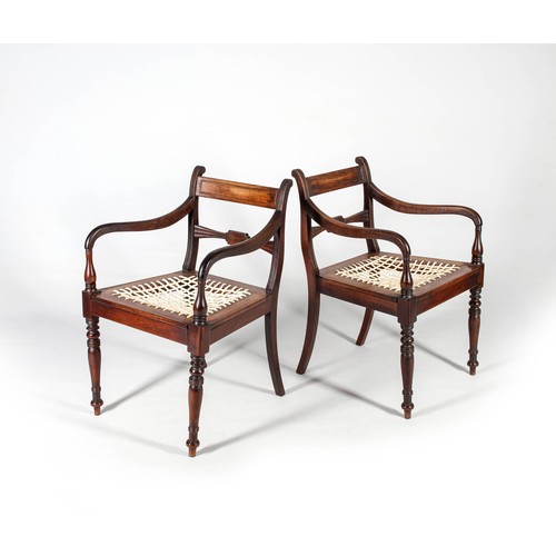 416 - A PAIR OF CAPE STINKWOOD BOW-TIE ARMCHAIRS