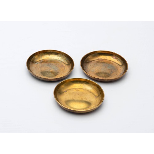 101 - THREE BRASS NUT DISHES