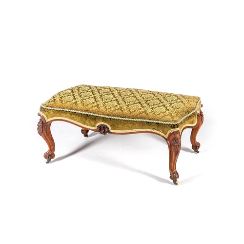 433 - A VICTORIAN MAHOGANY AND UPHOLSTERED OTTOMAN