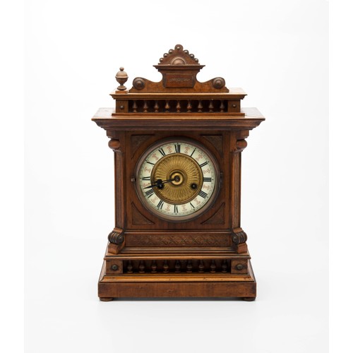 51 - A WALNUT MANTEL CLOCK, MANUFACTURED BY HAC, GERMANY, 20TH CENTURY