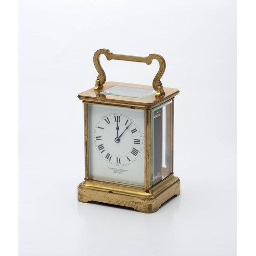 61 - A FRENCH BRASS CARRIAGE CLOCK, RETAILED BY THE GOLDSMITHS AND SILVERSMITHS CO, LONDON