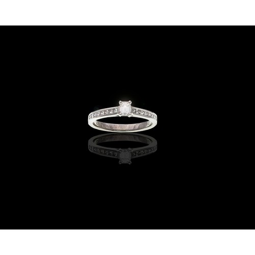 912 - A NATURAL DIAMOND DRESS RING, 0.55 CARATS