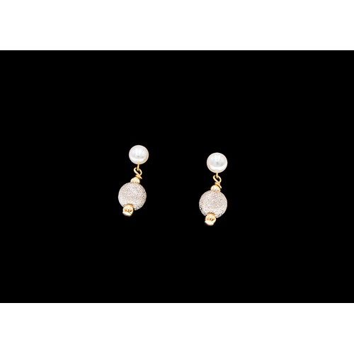 938 - A PAIR OF PEARL DROP EARRINGS