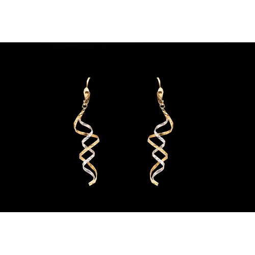 960 - A PAIR OF GOLD TWIST STYLE EARRINGS