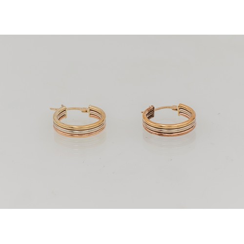 961 - A PAIR OF THREE-TONE GOLD HOOP EARRINGS