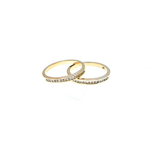 11004 - A PAIR OF NATURAL DIAMOND HALF ETERNITY RINGS