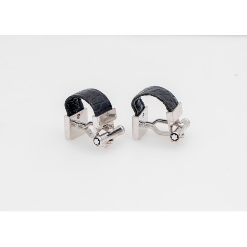 11010 - A PAIR OF STERLING SILVER AND LEATHER MONTBLANC CUFFLINKS