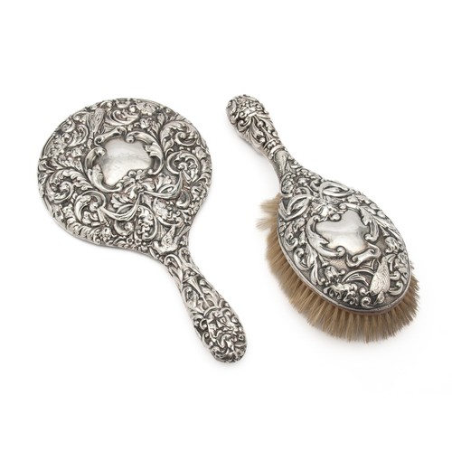 733 - AN EDWARD VII SILVER BACKED HAIR BRUSH AND HAND MIRROR, BIRMINGHAM, 1907