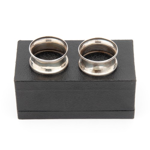 742 - A CASED SET OF GEORGE V SILVER NAPKIN RINGS, NAPPER AND DAVENPORT, BIRMINGHAM, 1924