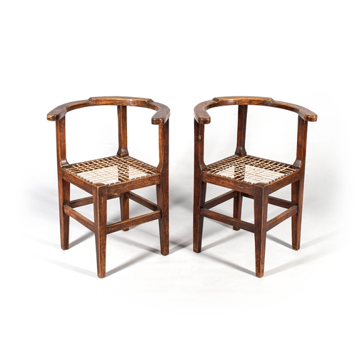 1099 - A PAIR OF CAPE STINKWOOD CORNER CHAIRS