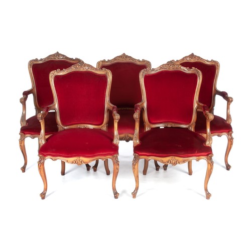 1102 - A SET OF FIVE FRUITWOOD UPHOLSTERED ARMCHAIRS