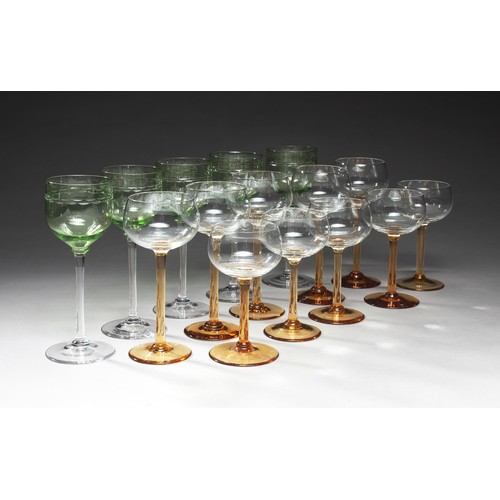 489 - A SET OF AMBER STEMMED WINE GLASSES IN VARIOUS SIZES