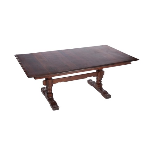 1076 - A MAHOGANY REFECTORY TABLE