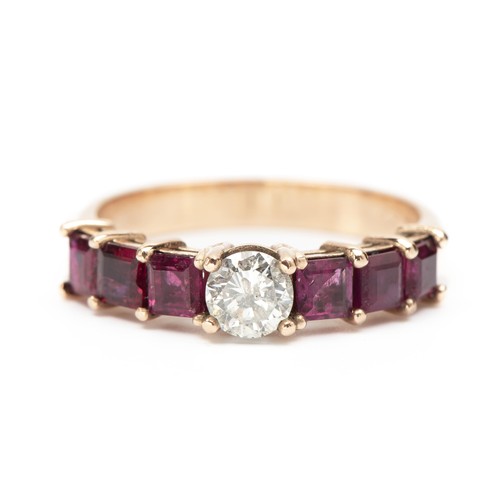 925 - A DIAMOND AND RUBY RING