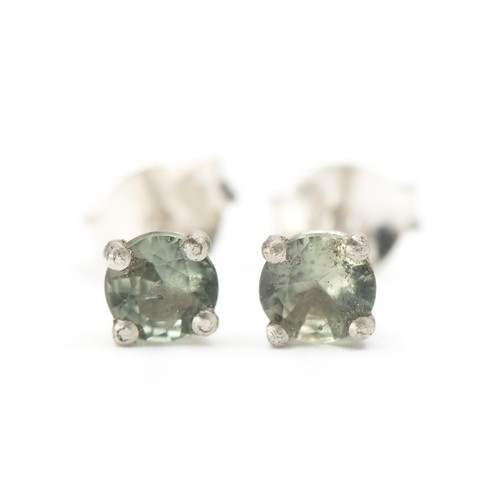 936 - A PAIR OF PERIDOT STUD EARRINGS, 0.25 CARATS