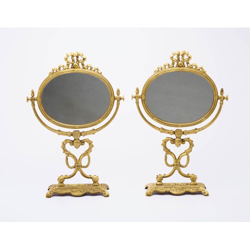 58 - A PAIR OF BRASS DRESSING TABLE MIRRORS